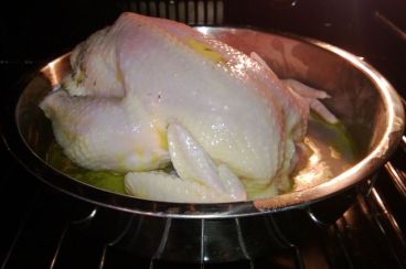 After buttering the chicken, it's ready for slow bake.